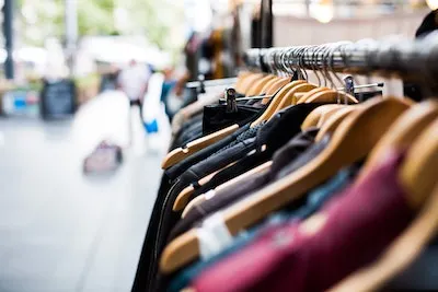 a hanger with clothes hanging on it