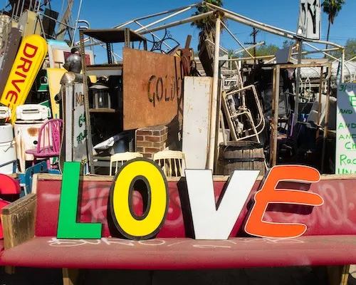 thrift store which says love and where you can find items to flip online for profit