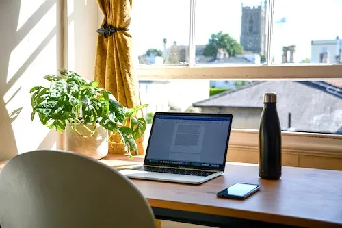 laptop on the table - post on best transcription jobs online for beginners