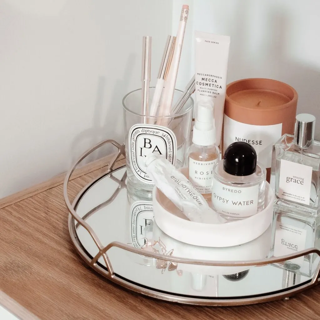 In this photo there is different skincare products kept in a tray. photo used for blog post on direct sales companies.
