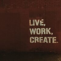 live work create written on a maroon background