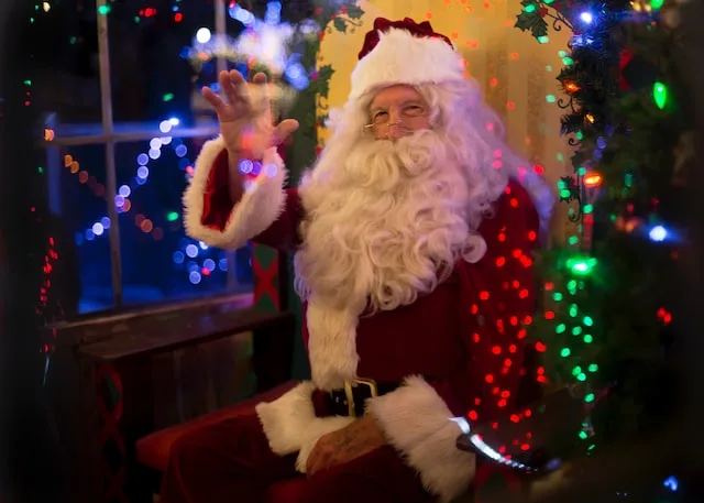 A man sitting in Santa Claus dress