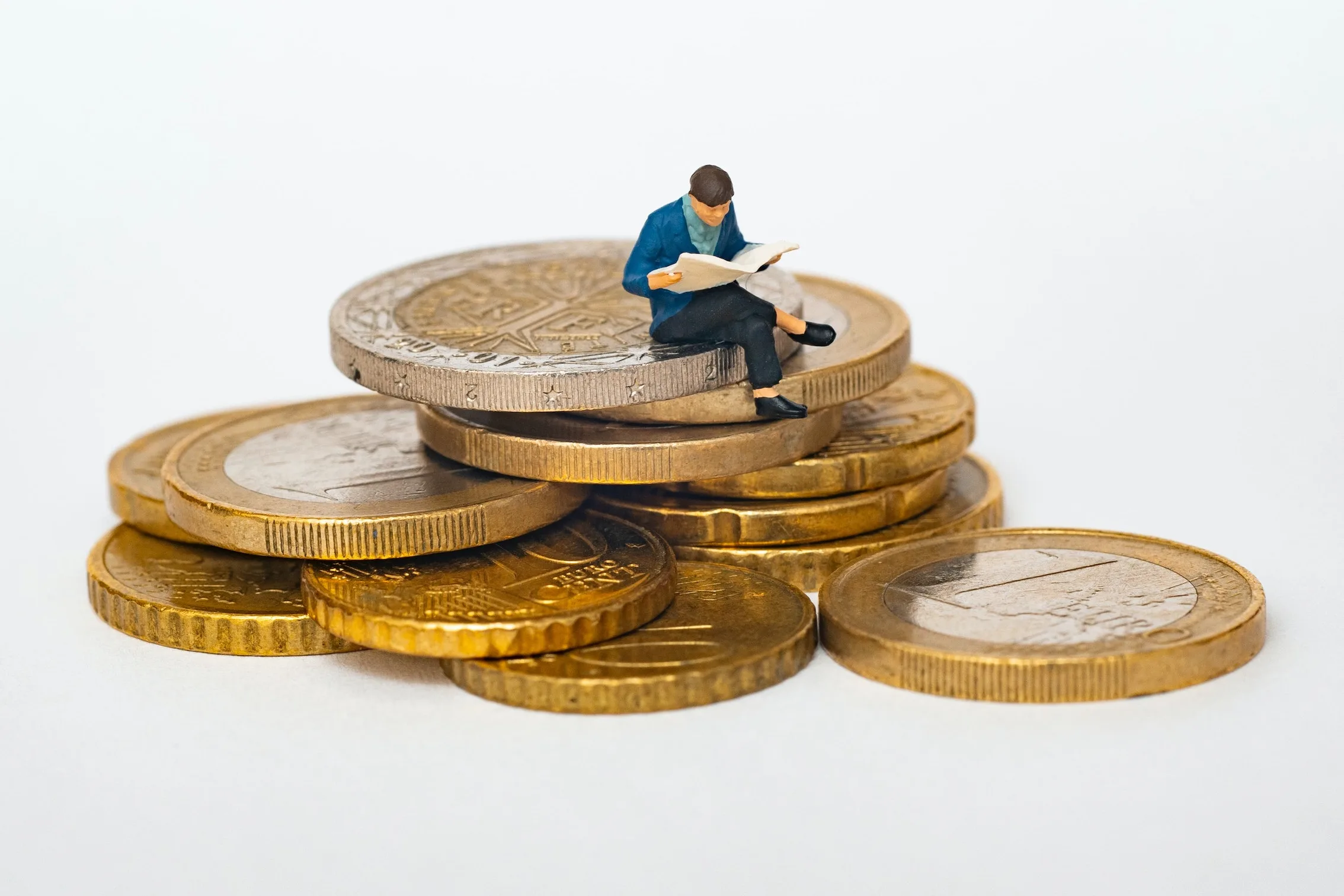 A man sitting on the coins