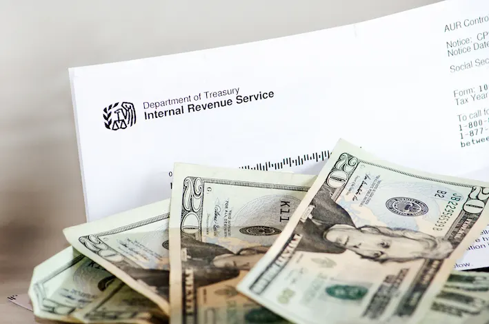 money and a document from IRS