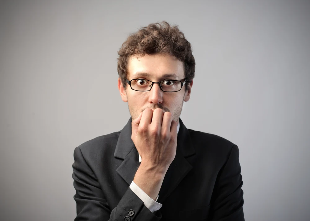 Young businessman with worried expression