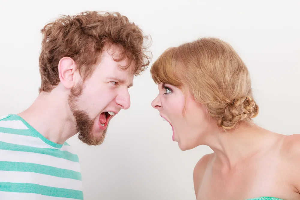 relationship difficulties. Angry woman and man yelling at each other. Face to face.