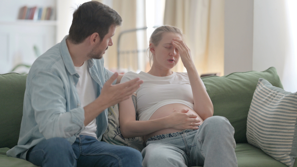 Husband having Argument Upset Pregnant Wife at Home