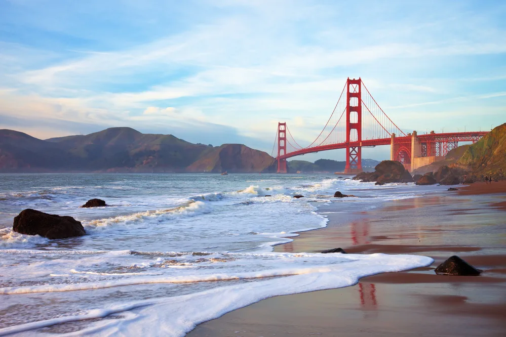 Golden Gate bridge at sunset seen from Marshall Beach, San Francisco.