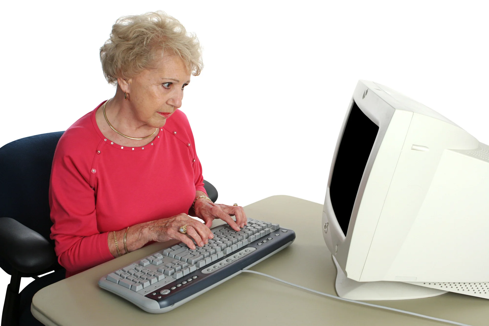 A senior lady confused by the computer. Screen intentionally blank ready for content.
