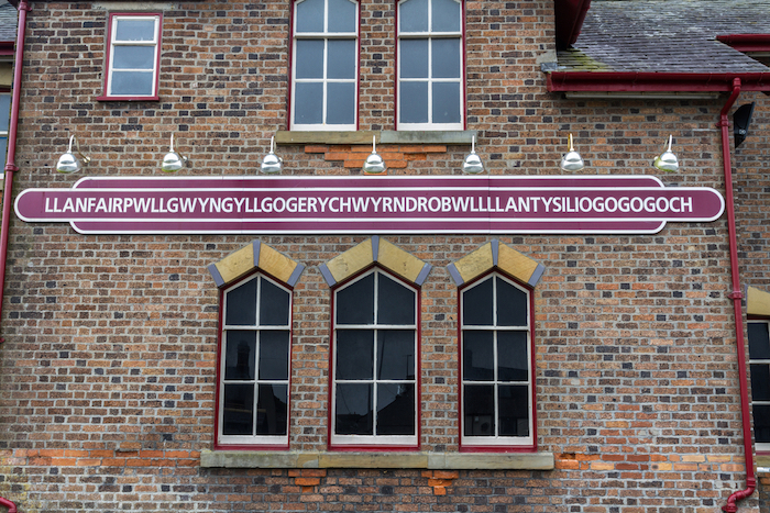 Name of Railway Station Llanfairpwllgwyngyllgogerychwyrndrobwllllantysiliogogogoch, Anglesey, Wales, United Kingdom.