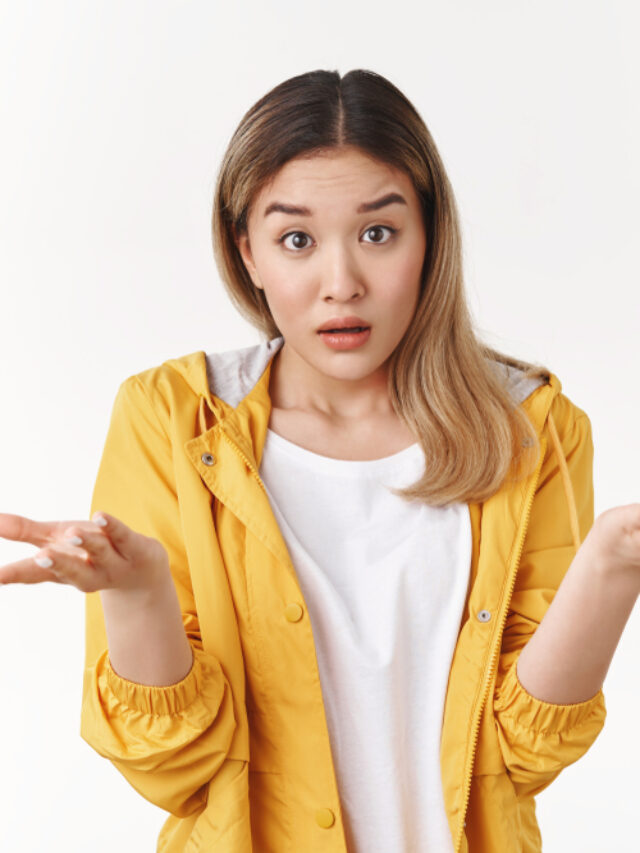 What,Wrong.,Ambushed,Shocked,Confused,Young,Asian,Girl,Coworker,Shrugging