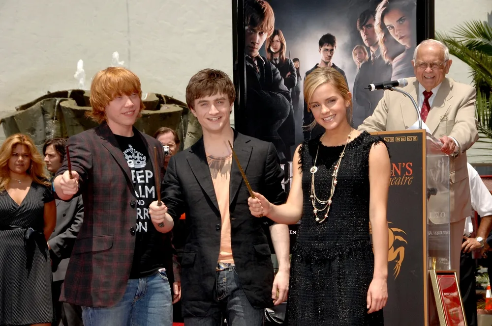 Rupert Grint, Daniel Radcliffe, Emma Watson at the induction ceremony for Harry Potter Foot-Print and Wand-Print Ceremony, Grauman''s Chinese Theatre, Los Angeles, CA, July 09, 2007. Photo by: Dee Cercone/Everett Collection