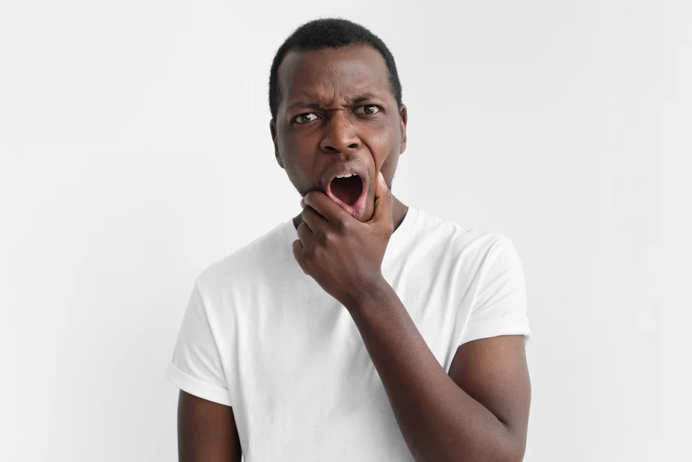 Young,African,American,Man,Isolated,On,Grey,Background,,With,Eyes.