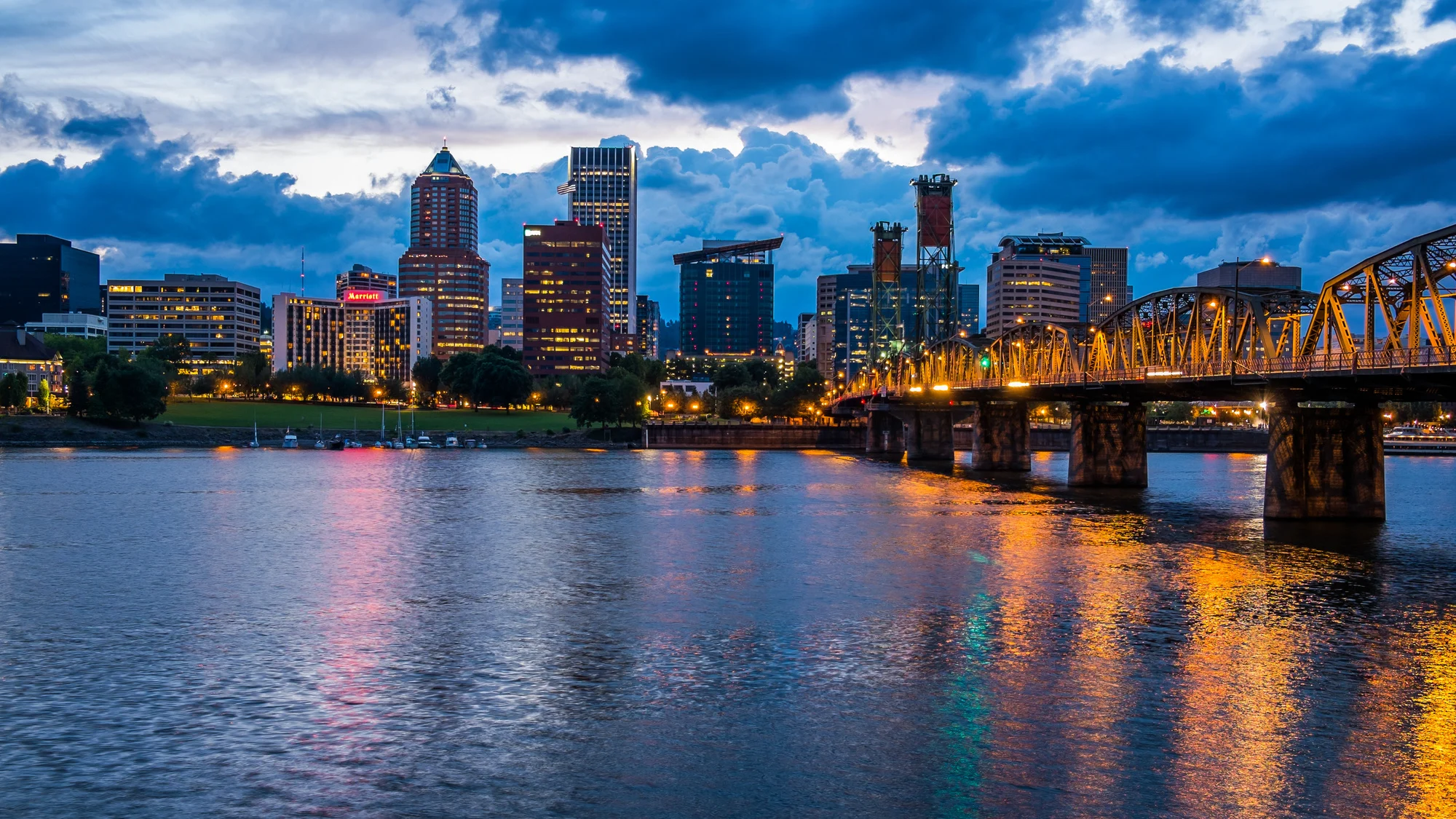 Colorful lights reflecting off the Willamette River in Downtown Portland, Oregon