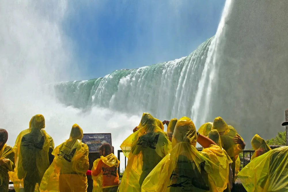 Tourists at the Horseshoe Fall, Niagara Falls, Ontario, Canada