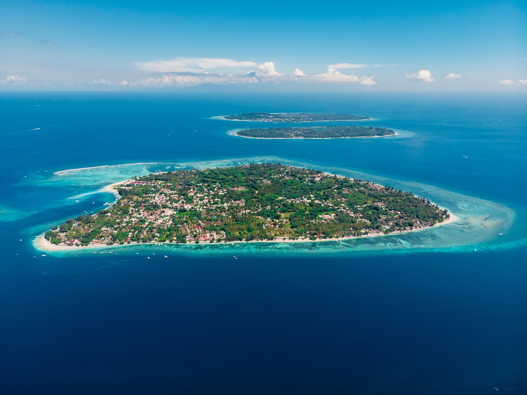 Aerial view with Gili islands and ocean, drone shot.