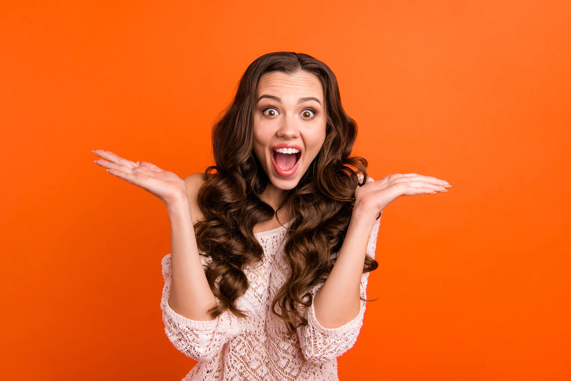 Portrait of her she nice attractive lovely charming cute cheerful cheery wavy-haired lady showing excitement isolated over bright vivid shine orange background.