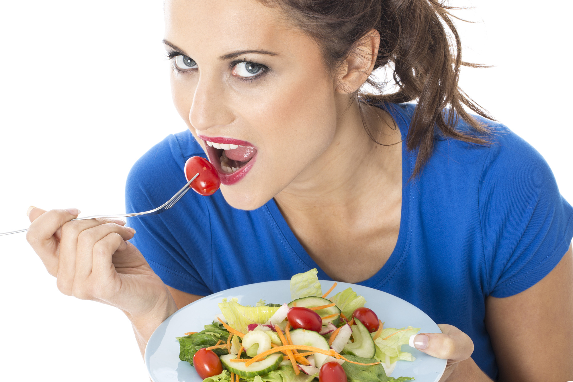 Model Released. Attractive Young Woman Eating Mixed Salad