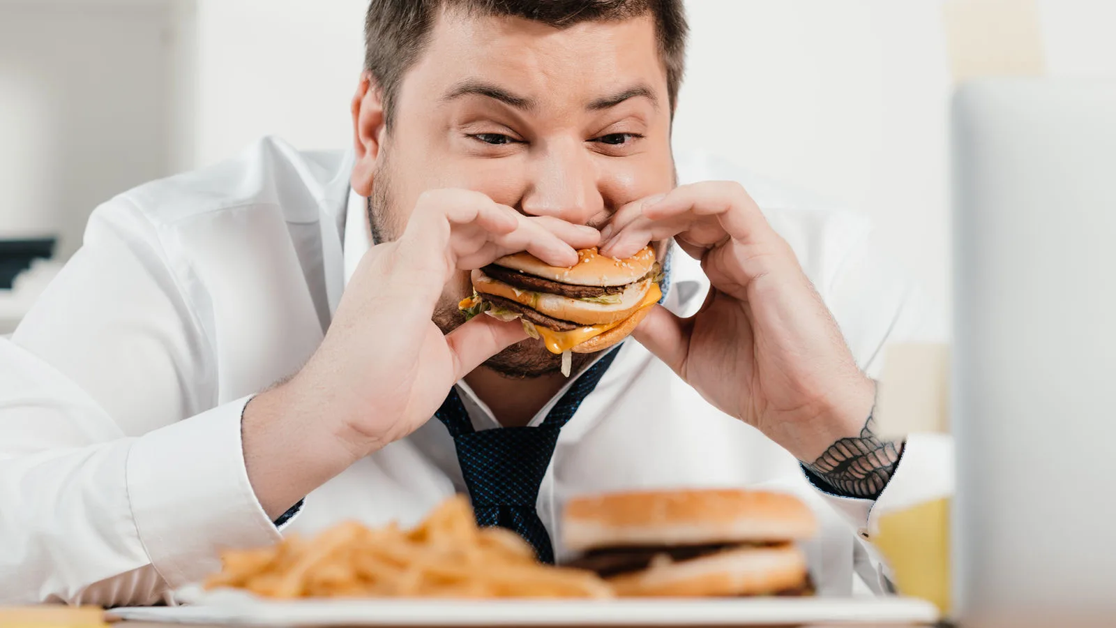 person eating burger, fast food