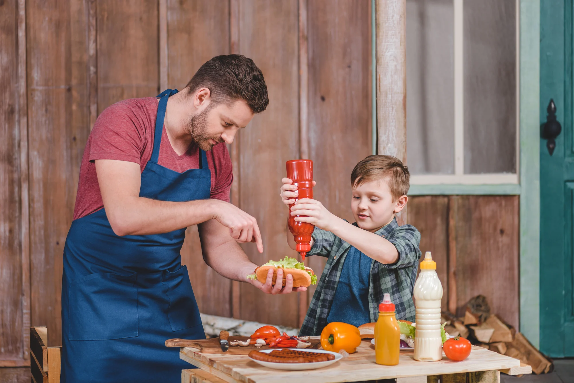 ketchup father kid cook eat family